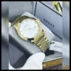 ساعه قوتشي رجاليه ذهبي