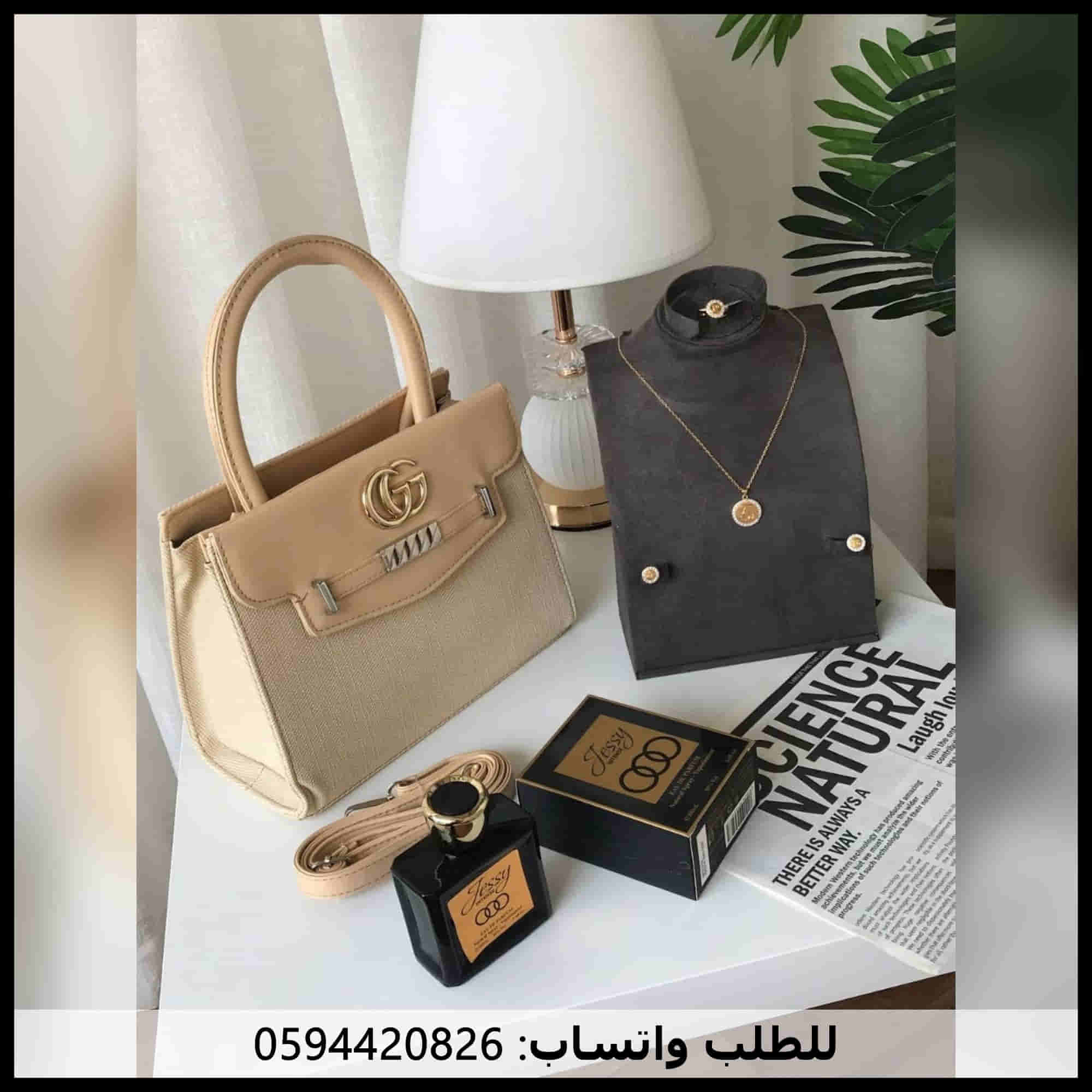 شنطه غوتشي لون جملي مائل للنحاسي