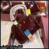 2025142 (3) شنطة توري بورش عنابي لامع Tory Burch