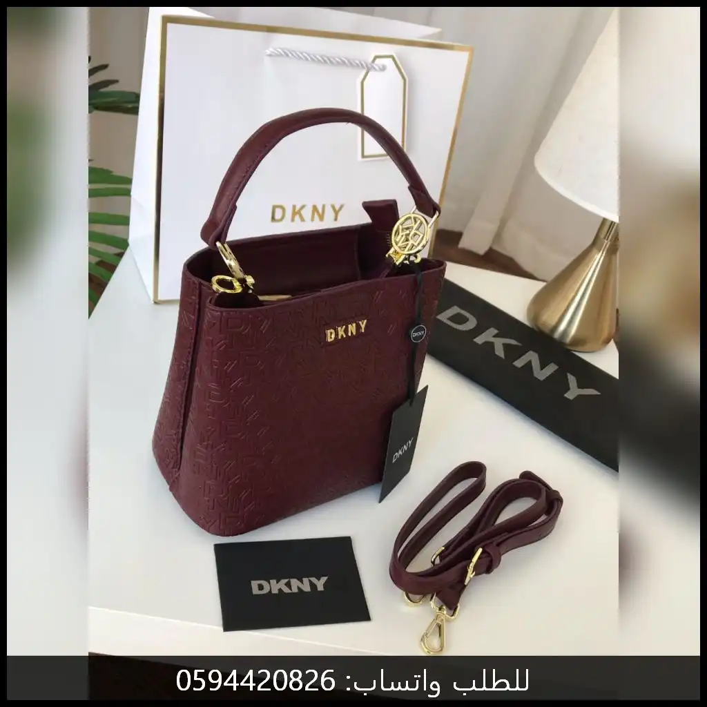 شنط DKNY جلد عنابيه