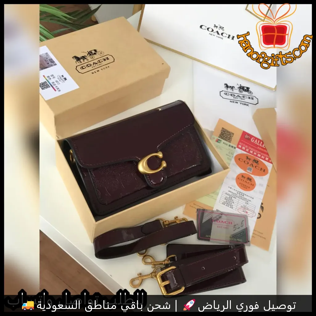 شنطة COACH نسائية عنابي غامق بتصميم لامع