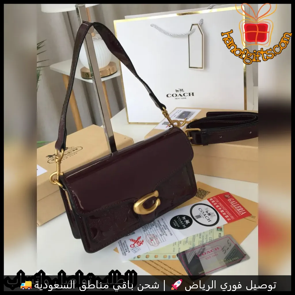 شنطة COACH نسائية عنابي غامق بتصميم لامع