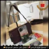 شنطة COACH نسائية عنابي غامق بتصميم لامع