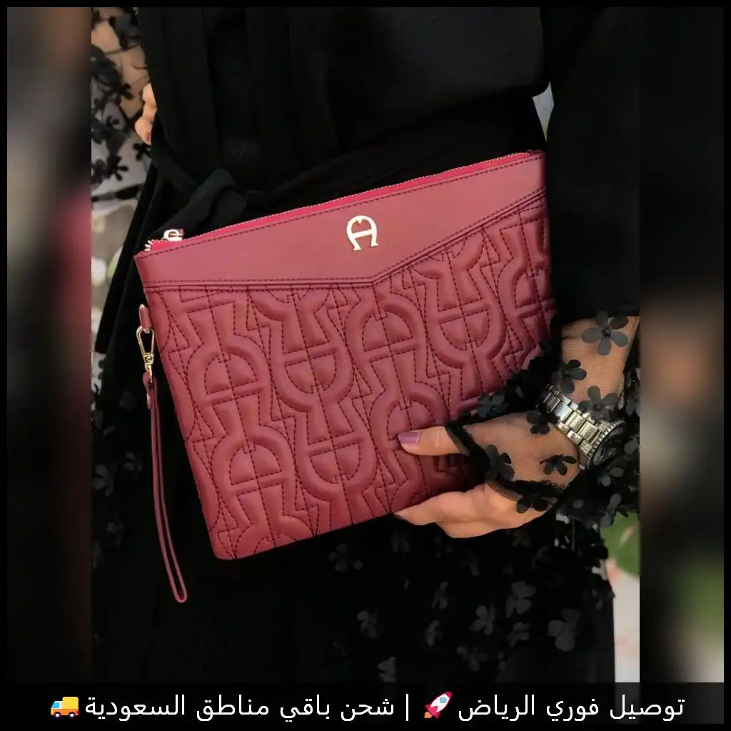 شنطة أقنر AIGNER باوتش عنابي حجم وسط