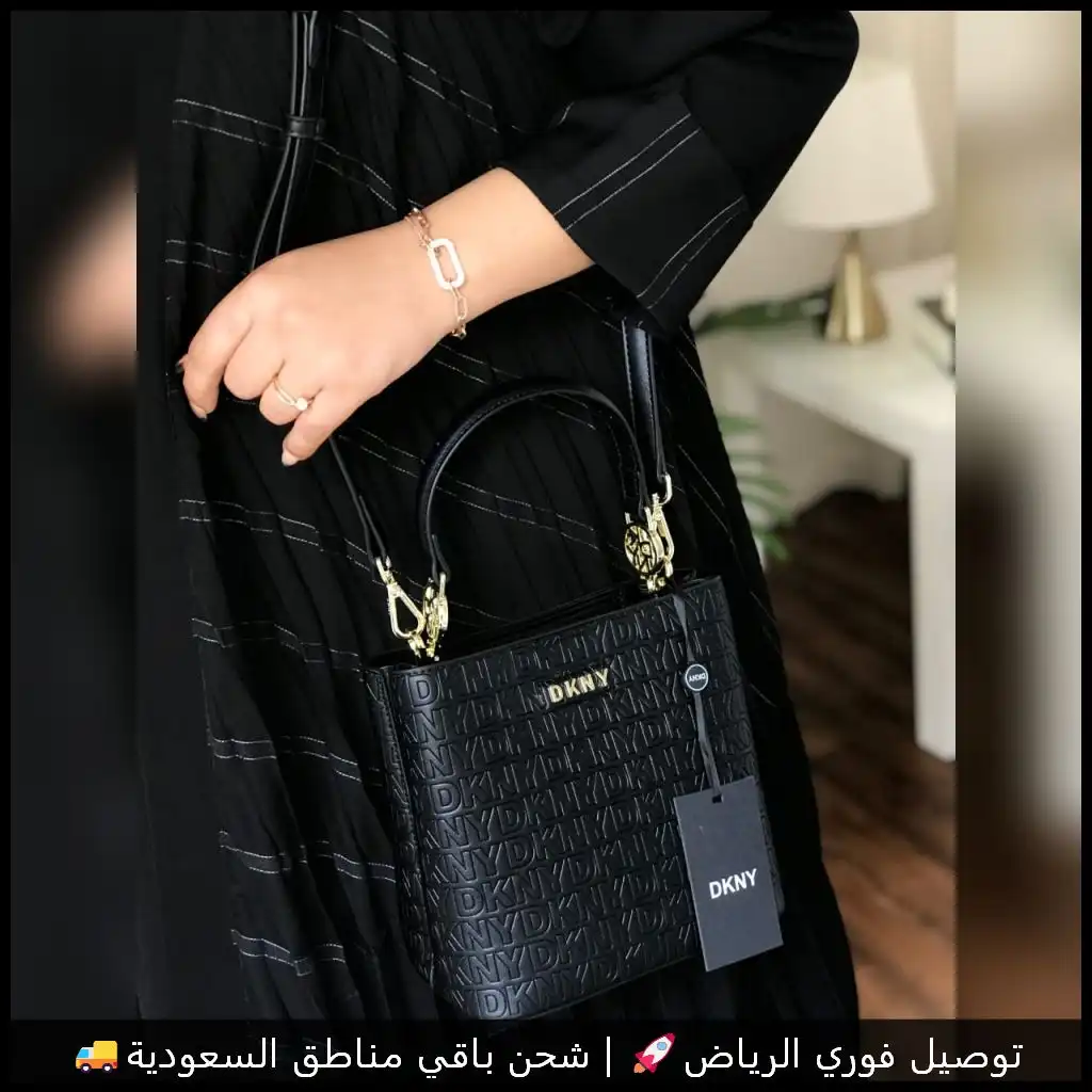 شنطة دكني جلد بلون أسود