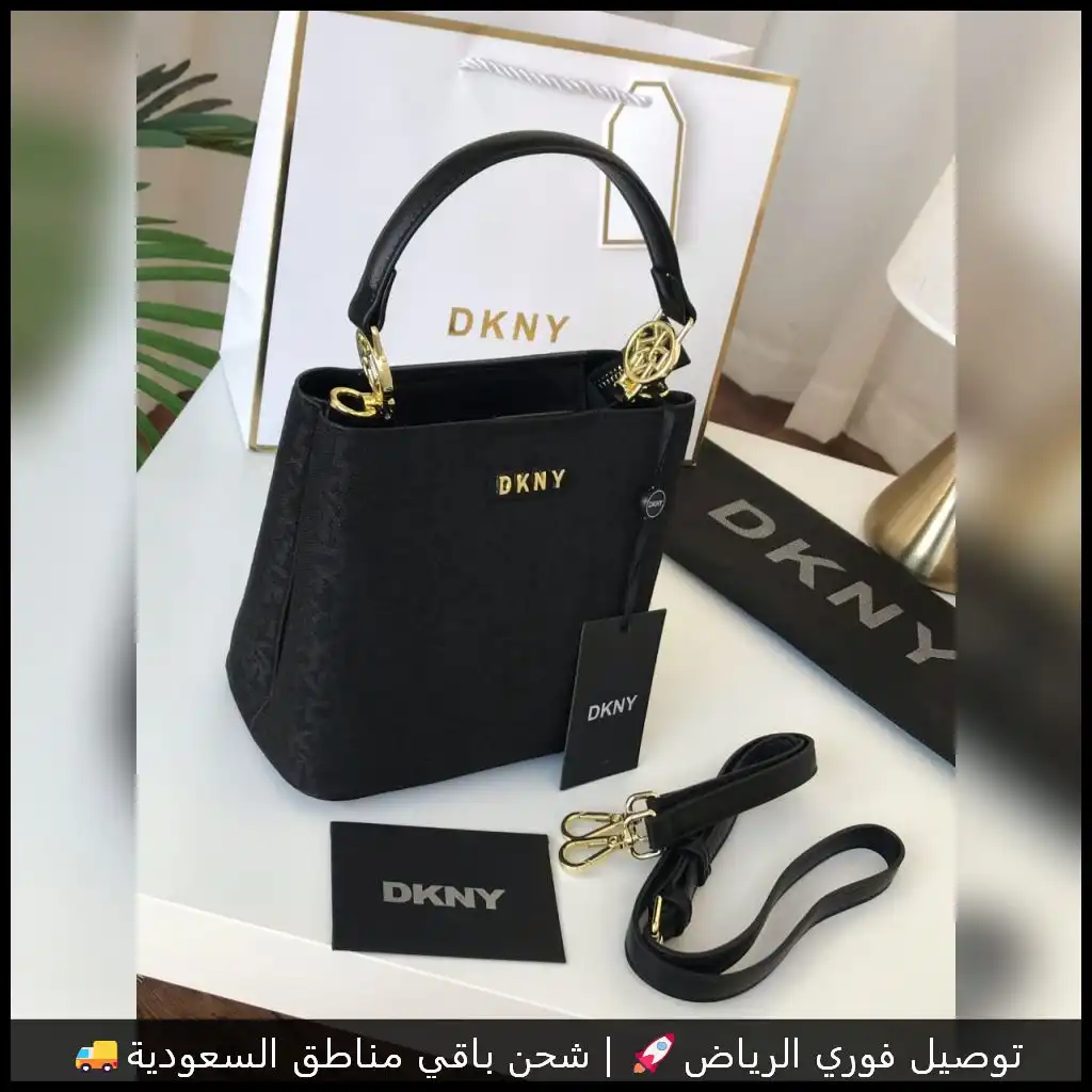 شنطة دكني جلد بلون أسود