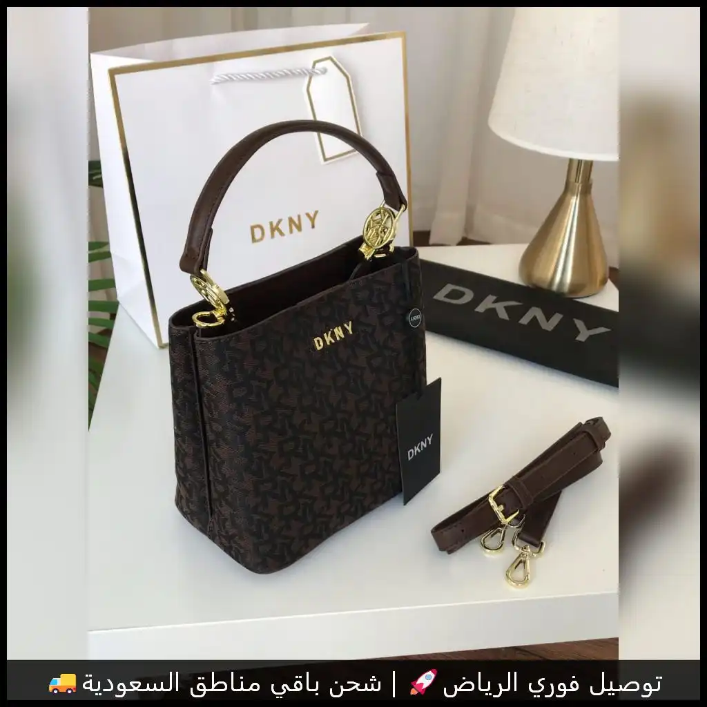 شنطة دكني جلد بلون أسود