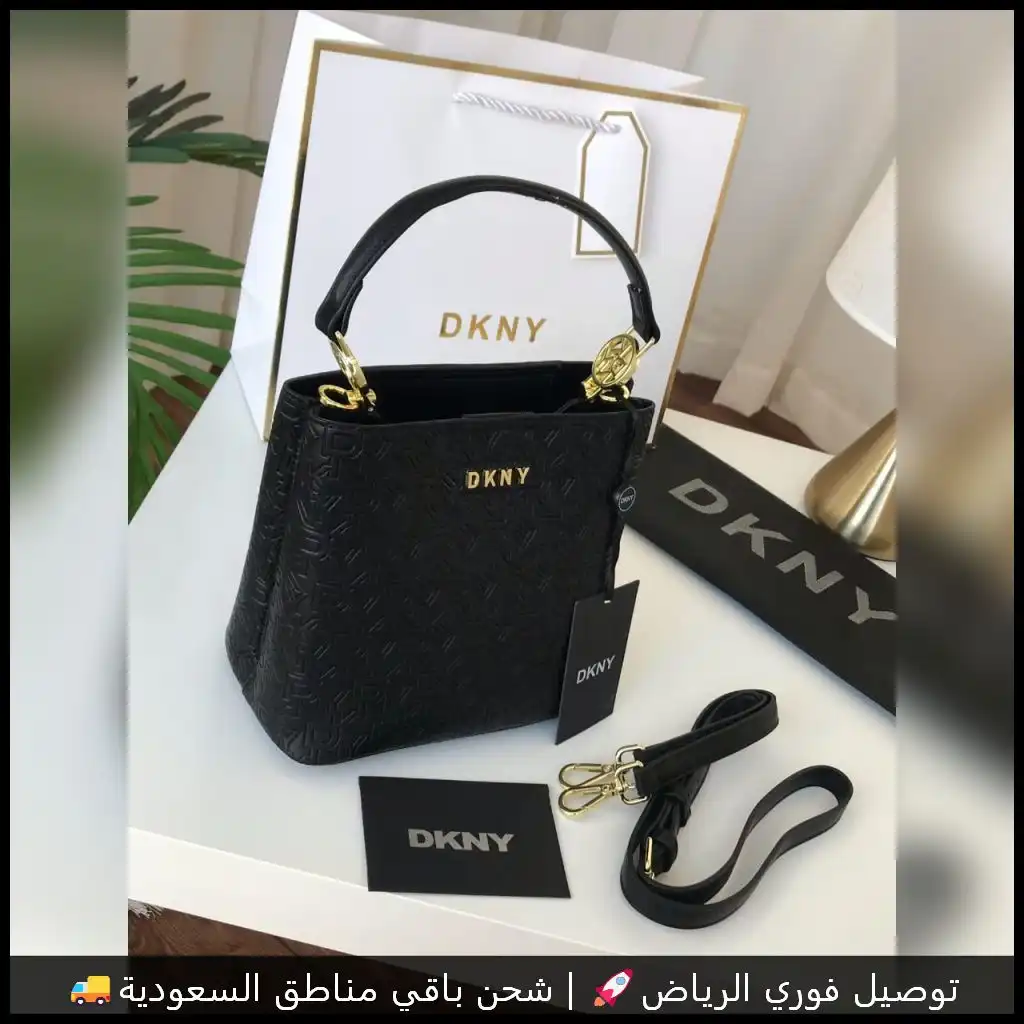 شنطة دكني جلد بلون أسود
