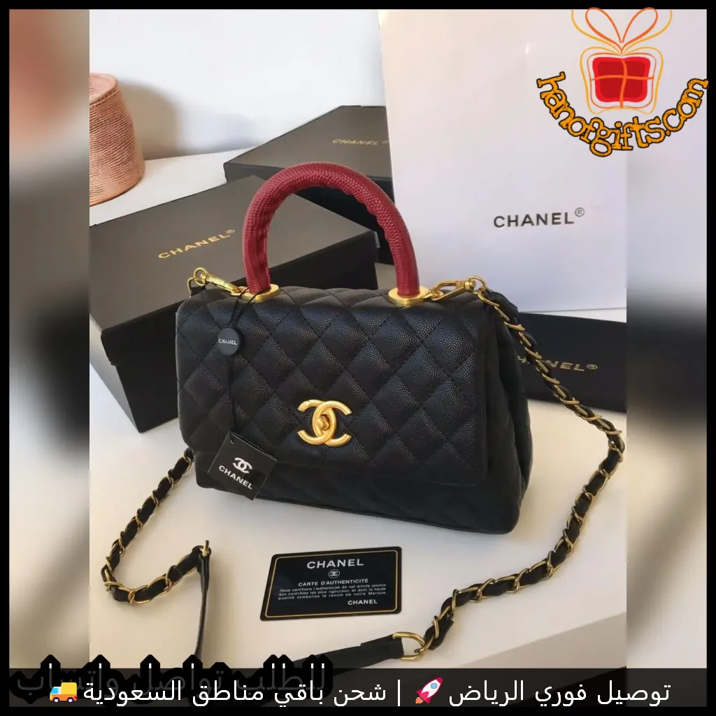 شنطة شانيل سوداء مع يد عنابي وسلسلة ذهبية
