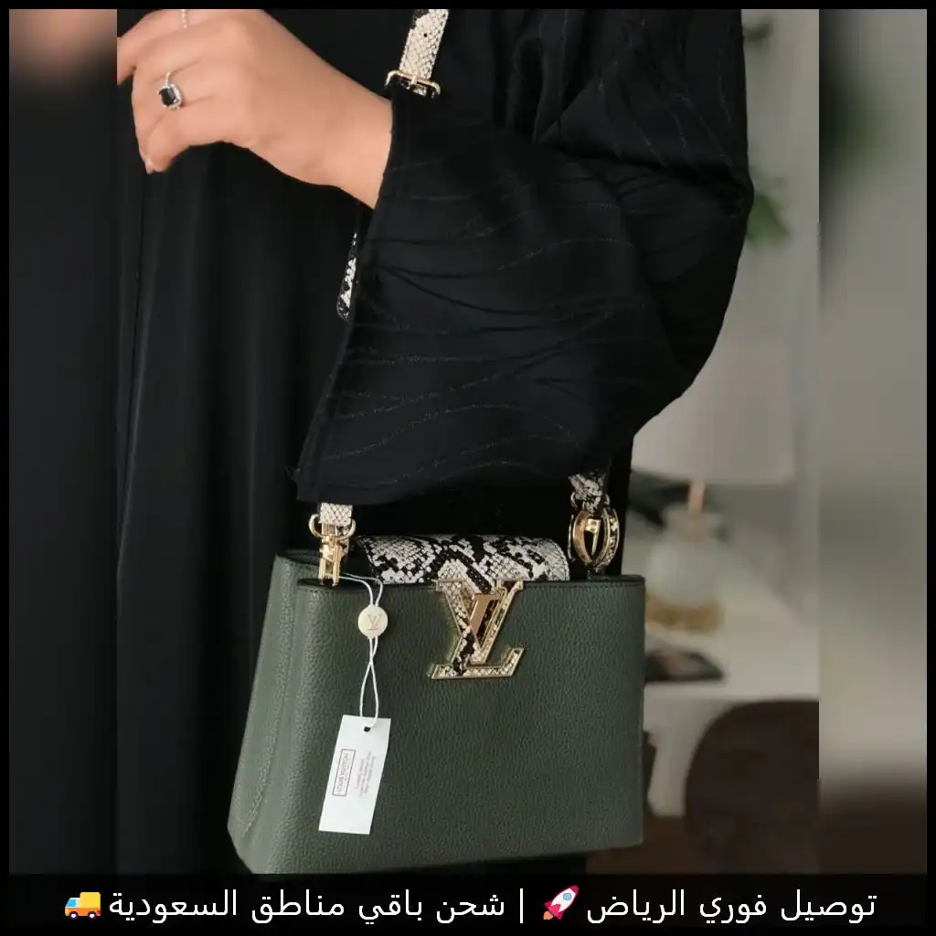 شنطة لويس فيتون زيتي جلد أفعى 3 شنطة لويس فيتون زيتي جلد أفعى