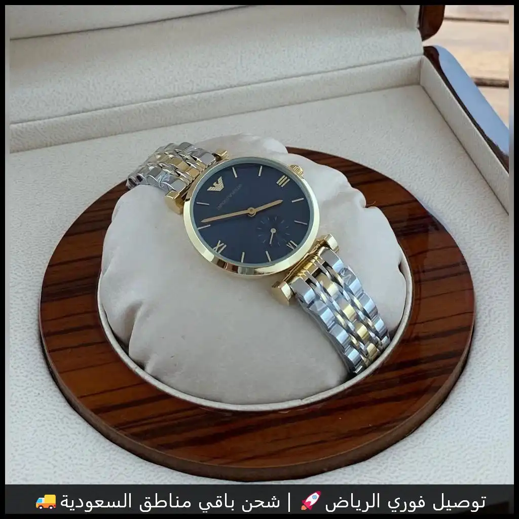 ساعة أرماني بمينا أسود وسوار ذهبي فضي