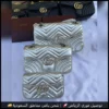 شنط قوتشي نسائية فضي لامع