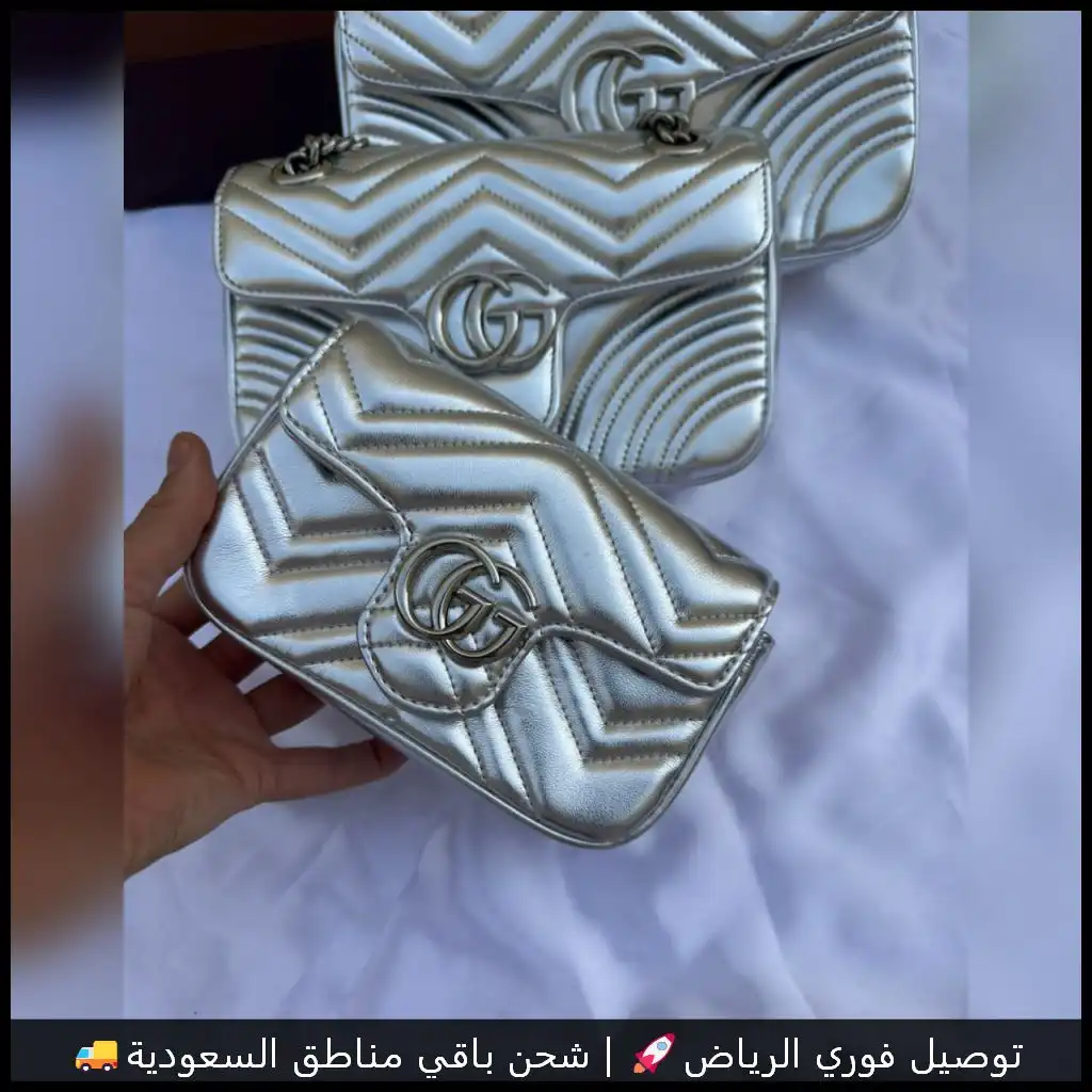 شنط قوتشي نسائية فضي لامع