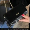 شنطة DKNY سوداء بنقشة الماركة