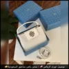 شنطة توري بورش ابيض لولو مرصعة