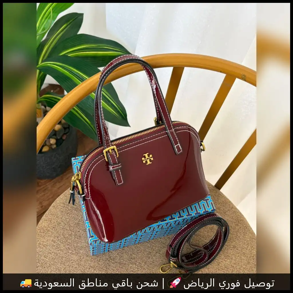 شنطة توري بورش بلون عنابي لامع