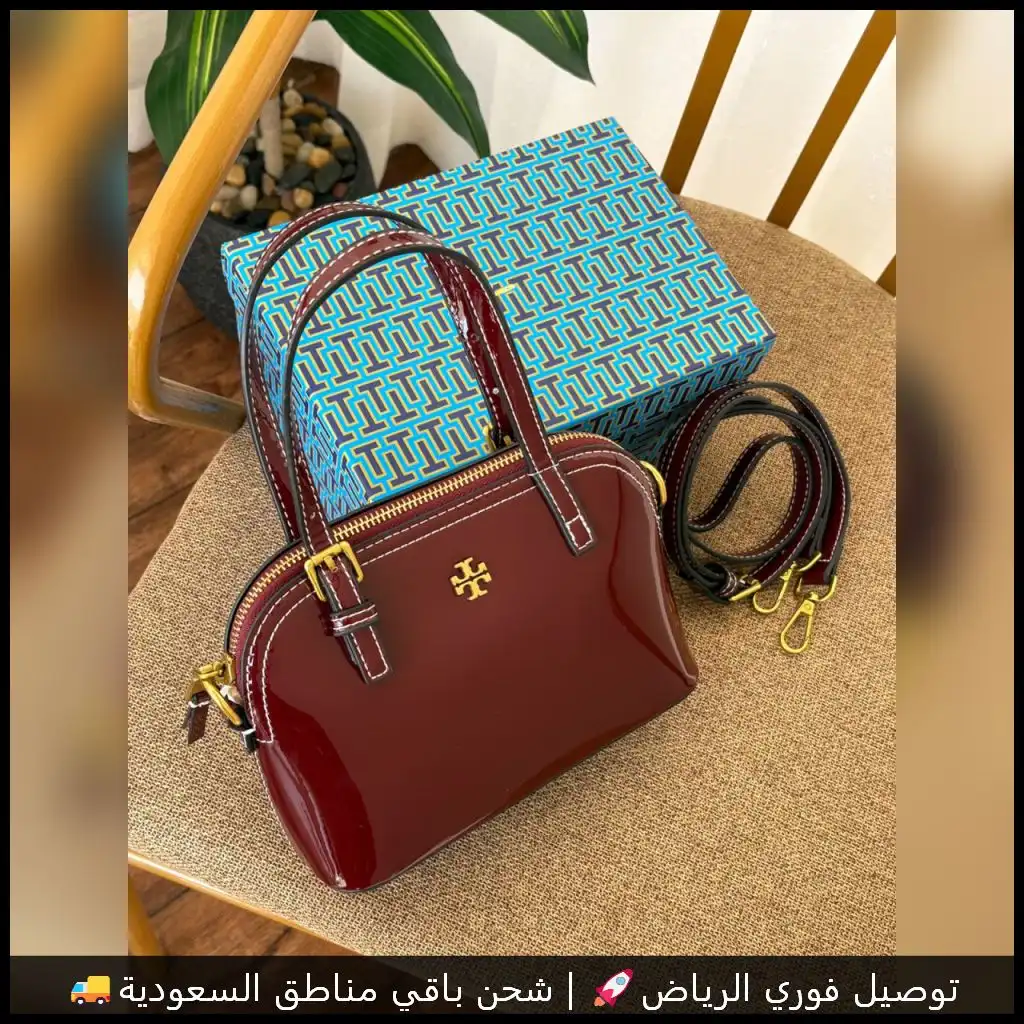 شنطة توري بورش بلون عنابي لامع