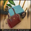 شنطة توري بورش بلون عنابي لامع