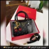 شنطة جيس السوداء بميدالية كرز