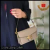 شنطة كوتش بلون بيج ذهبي حجم وسط