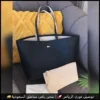 شنطة لاكوست بلون أسود وبيج