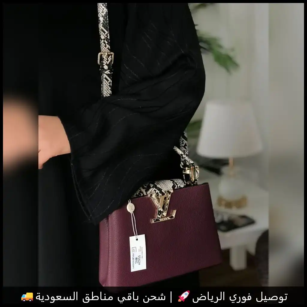 شنطة لويس فيتون عنابي بنقشة الثعبان