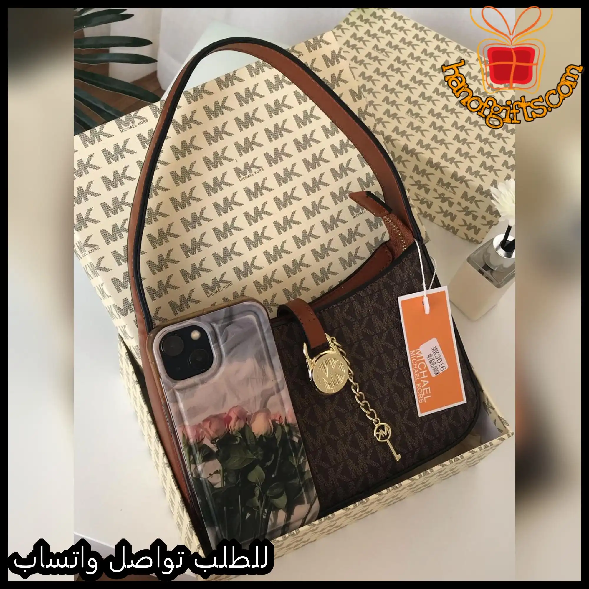 شنطة مايكل كورس بنية بنقشة MK 3 شنطة مايكل كورس بنية بنقشة MK