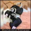 شنطة ميو ميو سوداء بشعار بارز متوفر ثلاث مقاسات (1) شنطة ميو ميو سوداء بشعار بارز متوفر ثلاث مقاسات