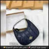 شنطة كوتش نسائية لون كحلي أنيق