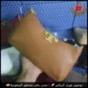 شنطة توري بورش بني جملي جلد