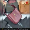 شنطة سان لوران الدلو عنابية