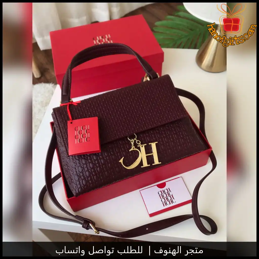 شنطة سي اتش نسائية بلون عنابي مع جميع الملحقات