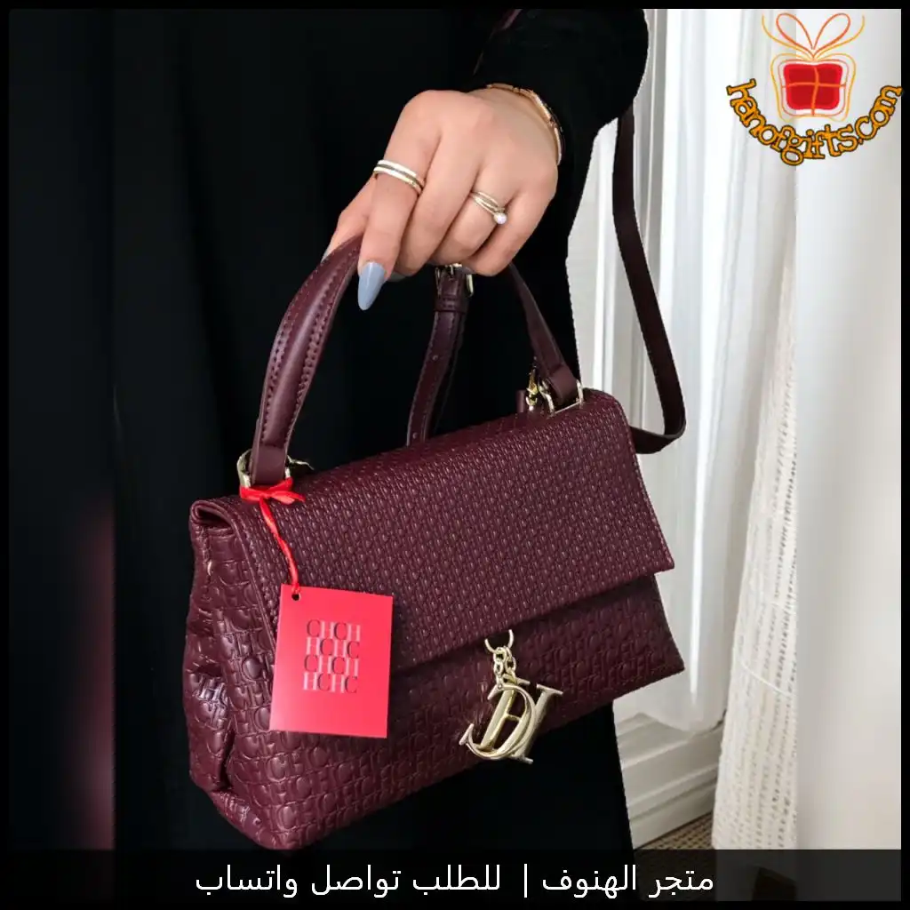 شنطة سي اتش نسائية بلون عنابي مع جميع الملحقات