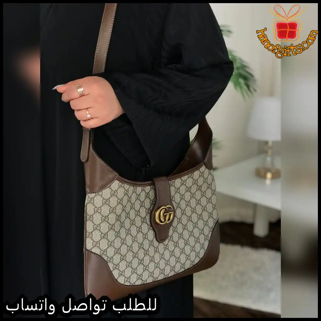 شنطة قوتشي بني مع نقشة GG