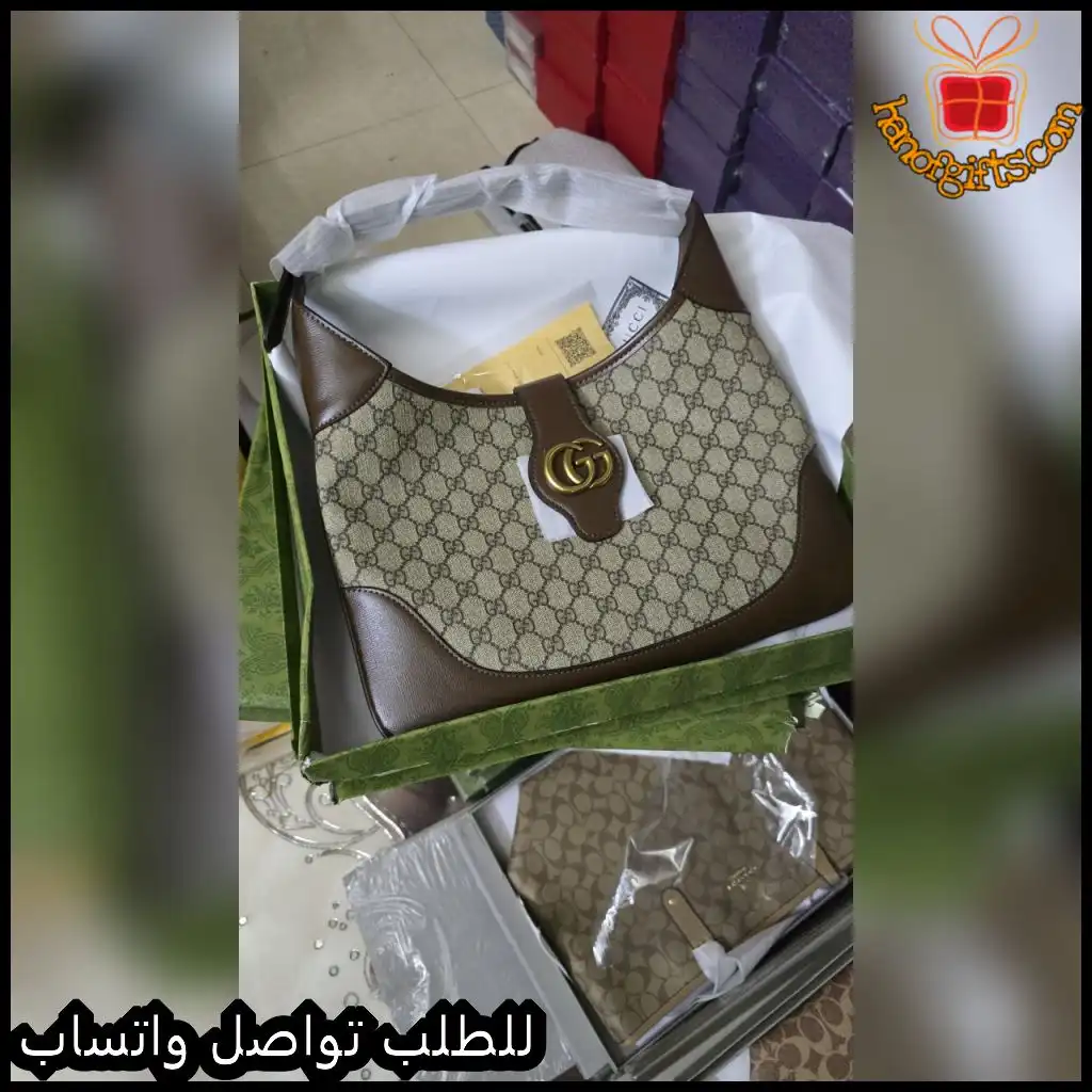 شنطة قوتشي بني مع نقشة GG