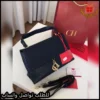 شنطة كارولينا هيريرا كحليه مع شعار ذهبي
