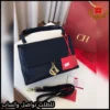 شنطة كارولينا هيريرا كحليه مع شعار ذهبي