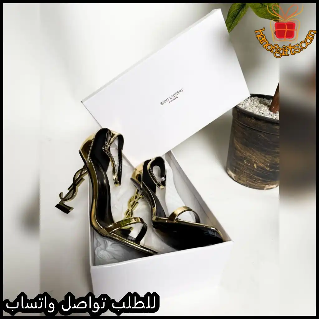 كعب سان لوران فضي مع كعب YSL