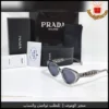 نظارات برادا نسائية بإطار شفاف رمادي وعدسات سوداء