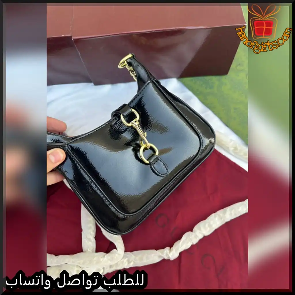 b2623 (1) شنطة قوتشي نسائية جلد لامع (اسود - عنابي)