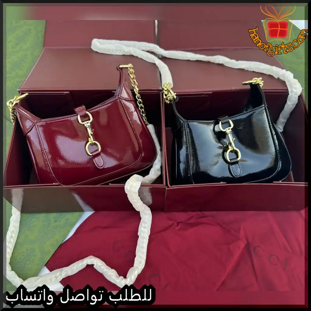 b2623 (2) شنطة قوتشي نسائية جلد لامع (اسود - عنابي)