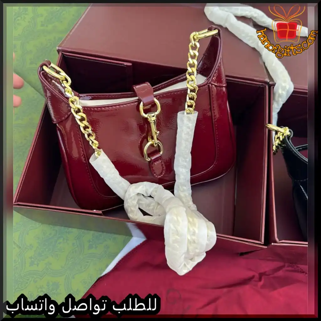 b2623 (5) شنطة قوتشي نسائية جلد لامع (اسود - عنابي)
