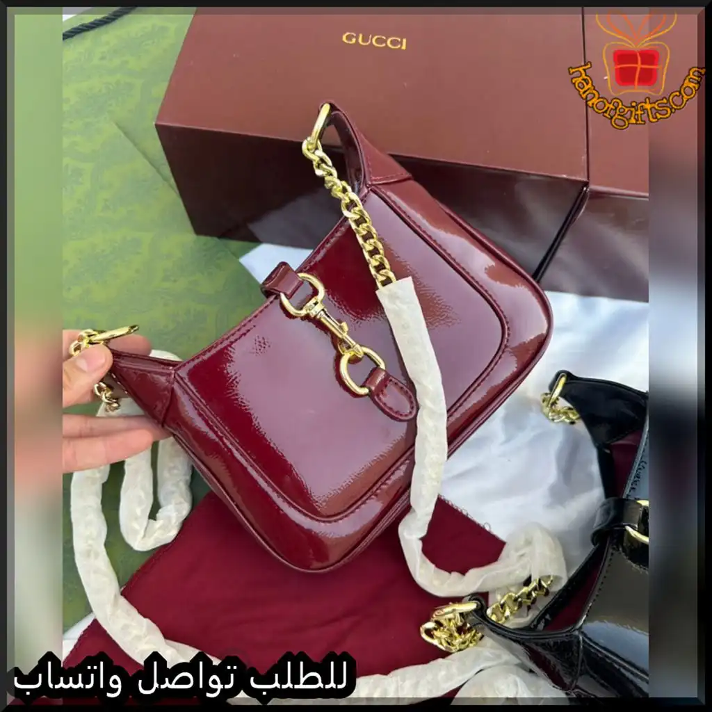 b2623 (6) شنطة قوتشي نسائية جلد لامع (اسود - عنابي)