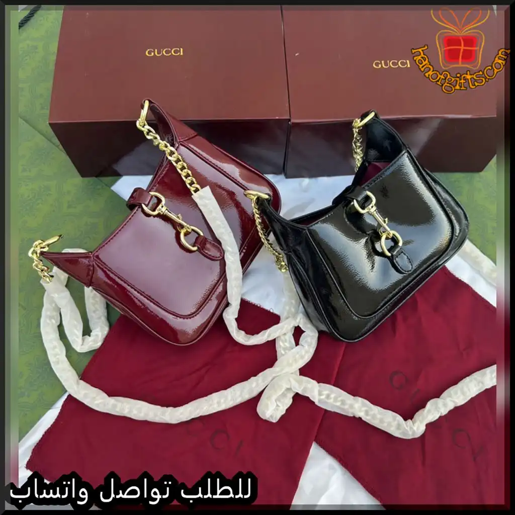 b2623 (9) شنطة قوتشي نسائية جلد لامع (اسود - عنابي)