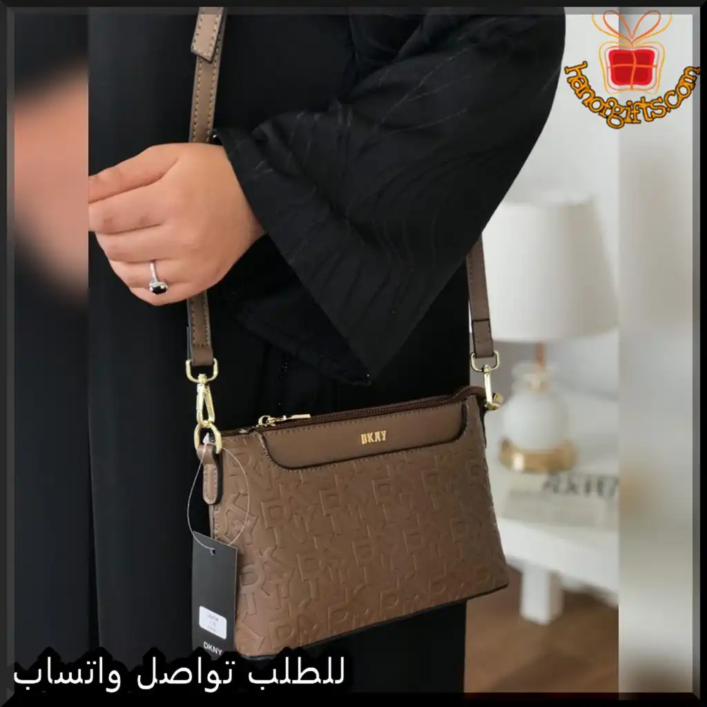 b2633 (6) شنطة دكني نسائية جلد بني منقوش