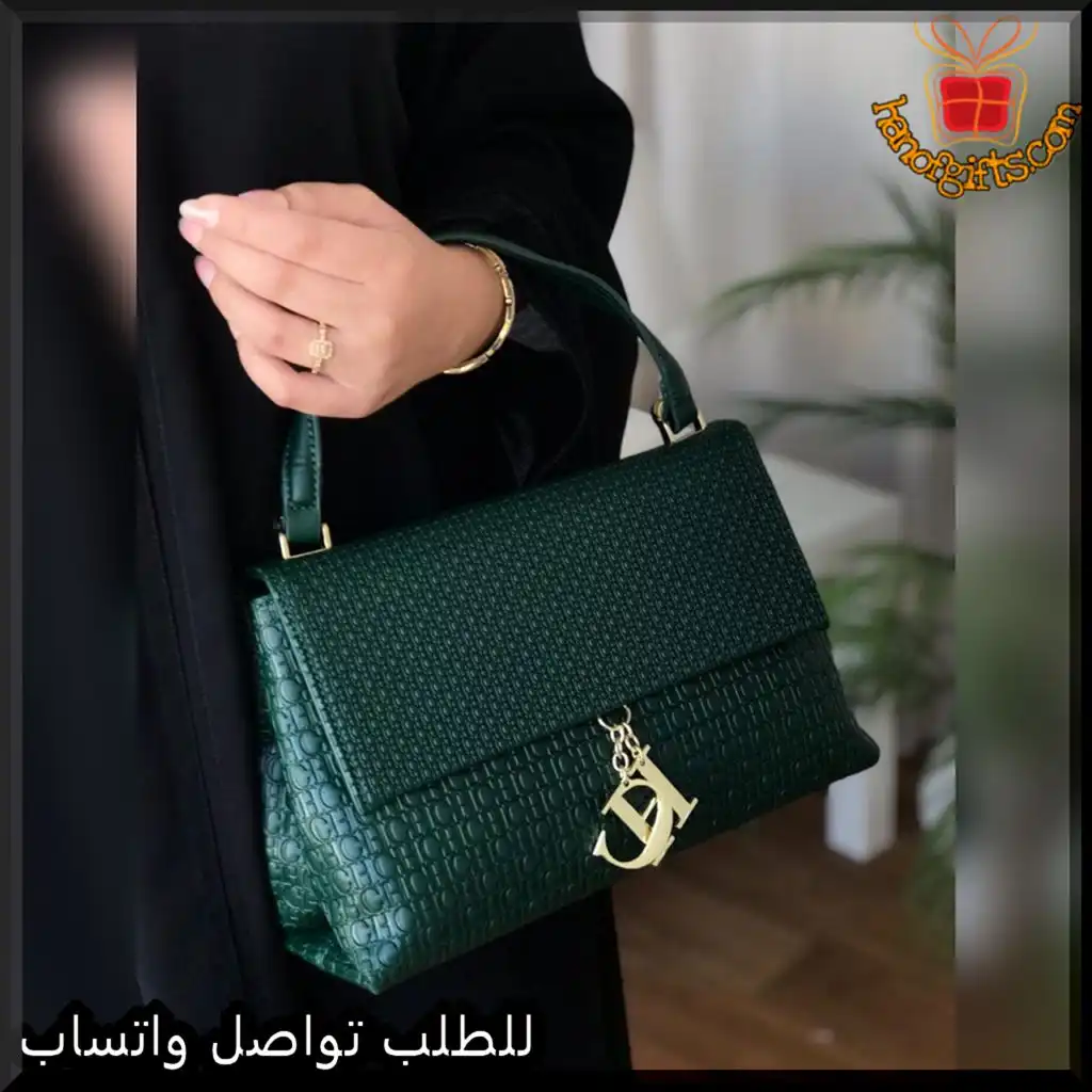 شنطة كارولينا هيريرا جلد أخضر غامق