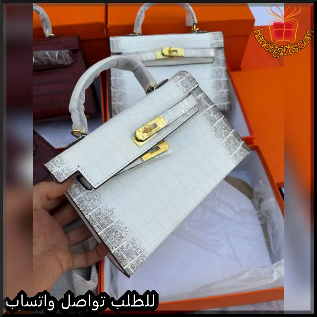 شنطة هرمز نسائية جلد تمساح أبيض متدرج بالفضي