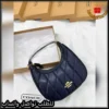 شنطة كوتش نسائية جلد مبطّن كحلي