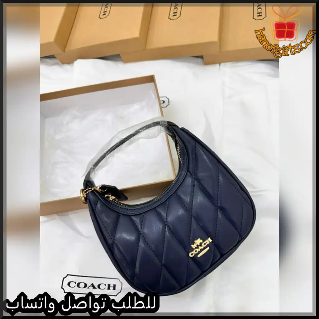 شنطة كوتش نسائية جلد مبطّن كحلي