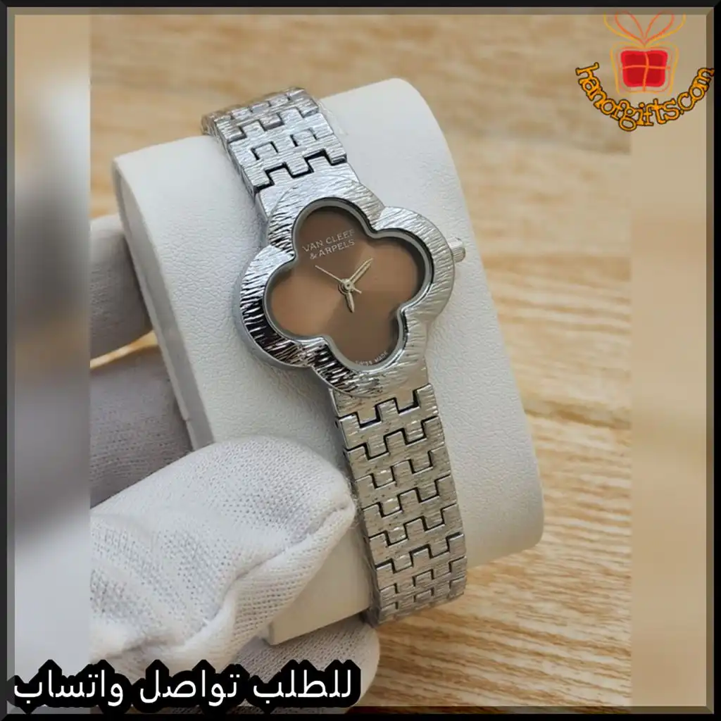 ساعة فان كليف بمينا ذهبي وإطار زهري فضي